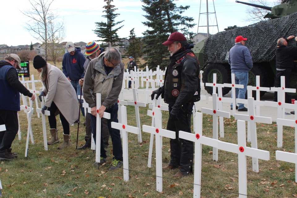 Volunteers, many of them veterans, erected crosses in memory of all those Canadian soldiers who lost their lives in Afghan War on Oct. 29. The event was sponsored by the #288 Royal Canadian Legion.