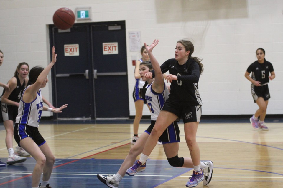 The George McDougall Mustangs faced off against the Ardrossan Bisons in the third-place game at the 2022 Bert Church Invitational Basketball Tournament on Saturday afternoon. 