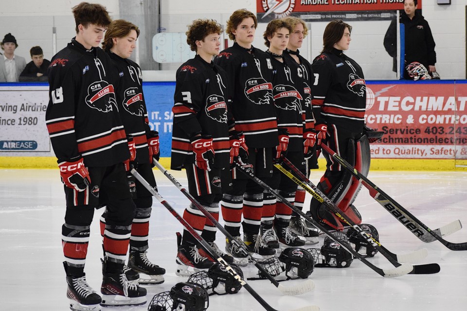 Seven Bisons played in their final minor hockey home game on Feb 24. L to R: Jack Drake, Ben Luterbach, Devon Barody, Nathan Maloney, Adrien Fox, Trey Mueller, and Mitchell Kathler were acknowledged by the home fans and started the game with applause from family and fans. 
