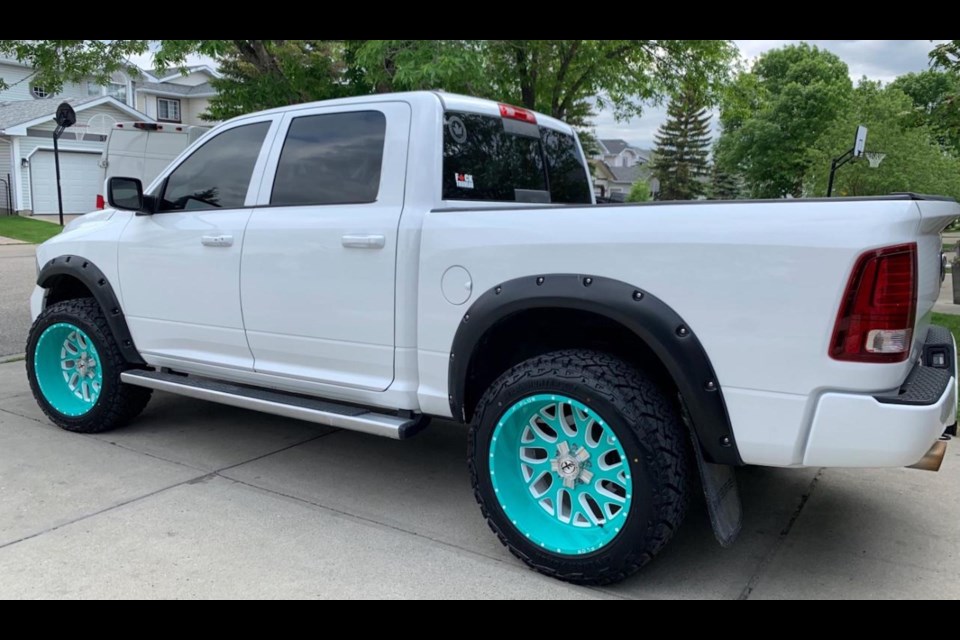 A vehicle involved in the Aug. 6 Rocky View County shooting was identified as a white 2013 Dodge Ram with teal aftermarket rims and shell shaped lug nuts. 