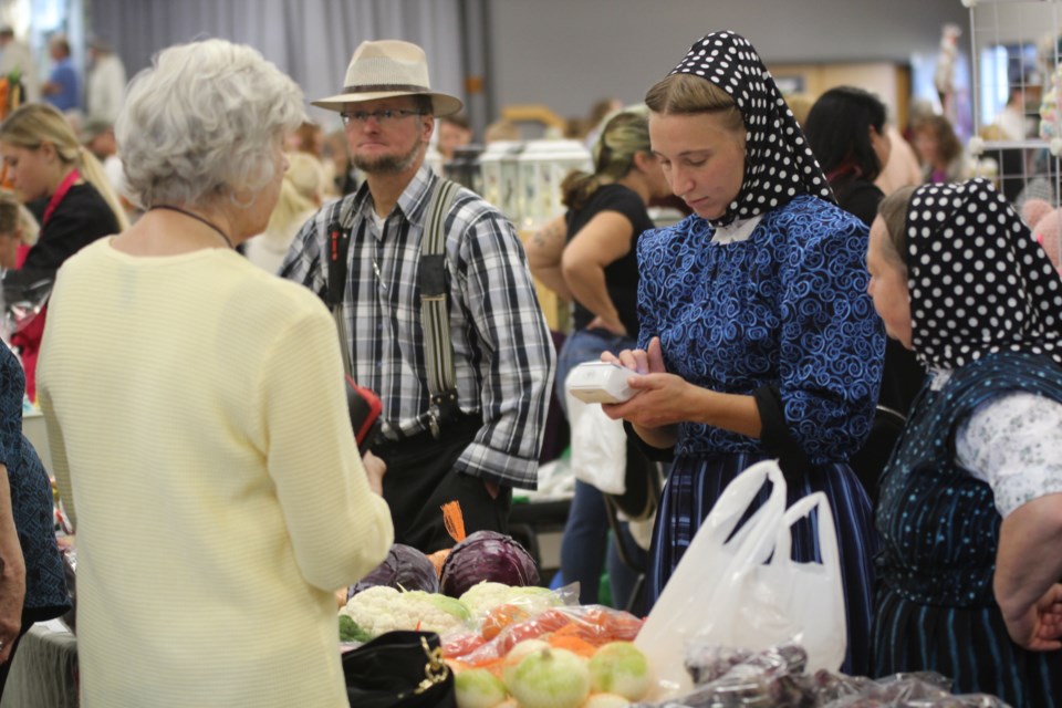 Britestone Colony members were selling fresh field vegetables and pickled veggies at the big Crossfield Fall Market on Saturday. 