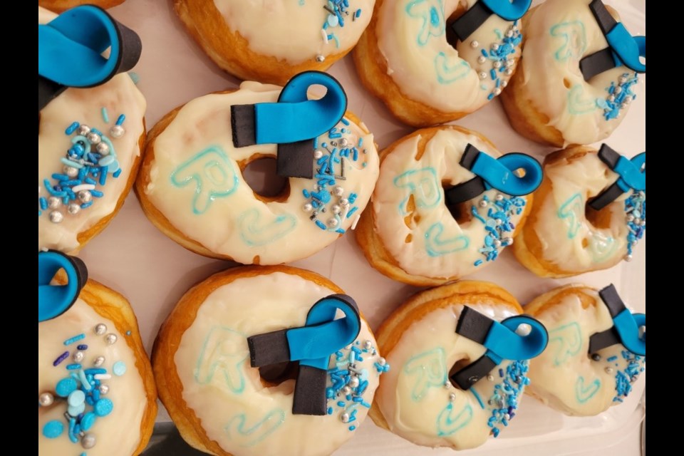 Samples of the types of ribbon doughnuts Crossfield's 'The Donut Man' is selling to raise funds for the families of fallen EPS Officers Travis Jordan and Brett Ryan.