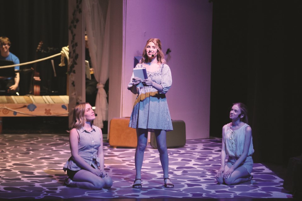 Bert Church High School student Brooklyn Barclay portrayed Sophie Sheridan in a production of Mamma Mia! at Bert Church LIVE Theatre on May 13. Pictured also are Heidi Tester and Aaralyn Stevenson who played Ali and Lisa.