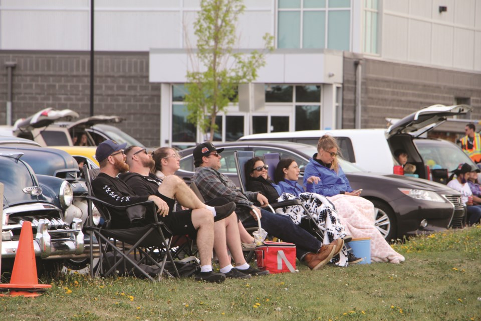 Several attendees brought lawn chairs to enjoy the outdoor screening of Jungle Cruise at Genesis Place on June 3.