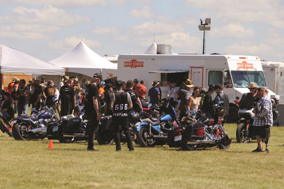 Attendees at Harley Davidson's Rally in the Rockies check out a selection of motorcycles on display at Airdrie Air Park on July 23. 