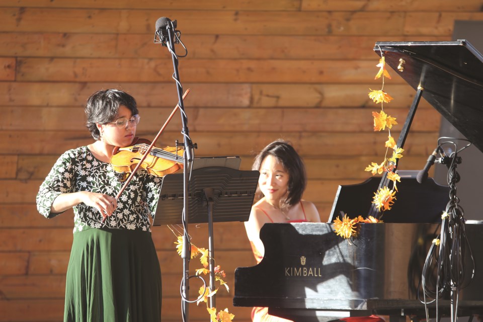 Former Airdronian Tong Wang and long-time friend Maitreyi Muralidharan performed for an audience during the opening day of Windwood Festival at Nose Creek Regional Park on Oct. 4.