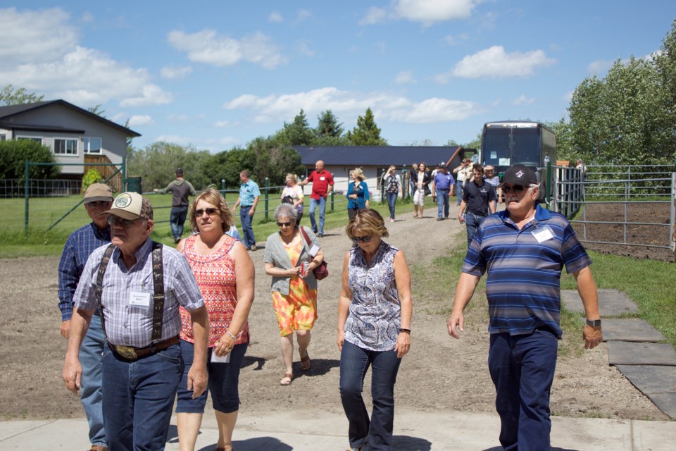 Rocky View County's 2019 Agricultural Tour July 25 made a stop at Glengary Bison, owned and operated by Gary and Cynthia Sweetnam, where participants got up close and personal with a herd of bison.
Photo by Ben Sherick/Rocky View Publishing