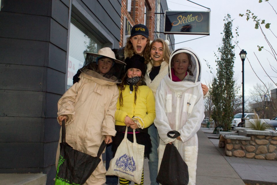 Costumed Cochrane residents took to the streets Oct. 31 to celebrate Halloween, trick-or-treating along the historic downtown strip. Photo by Daniel Gonzalez/The Cochrane Eagle.