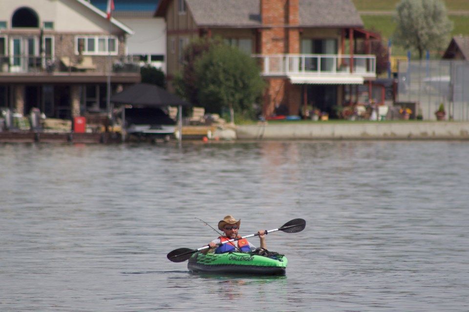 Chestermere Lake offered a relaxing destination for the Heritage Day long weekend, with crowds taking advantage of an opportunity to boat, kayak, paddleboard or simply lounge on the beach.
Photo by Ben Sherick/Rocky View Publishing