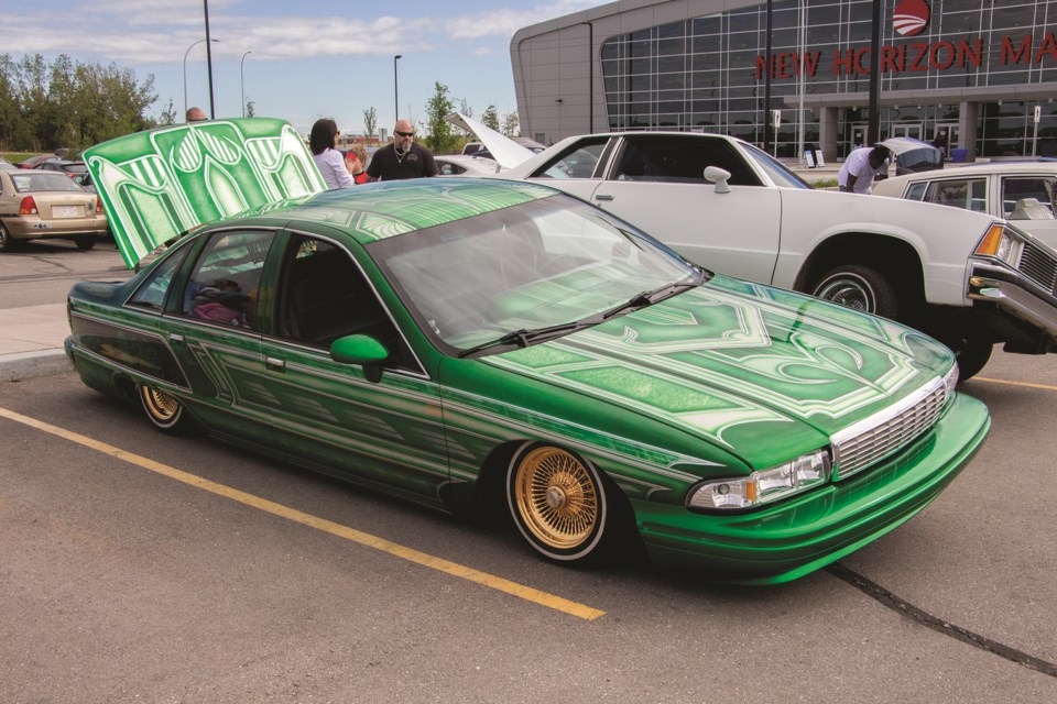 A lowrider showcases an intricate and vibrant paint job during the car show at New Horizon Mall July 25. Photo by Jordan Stricker/Airdrie City View.