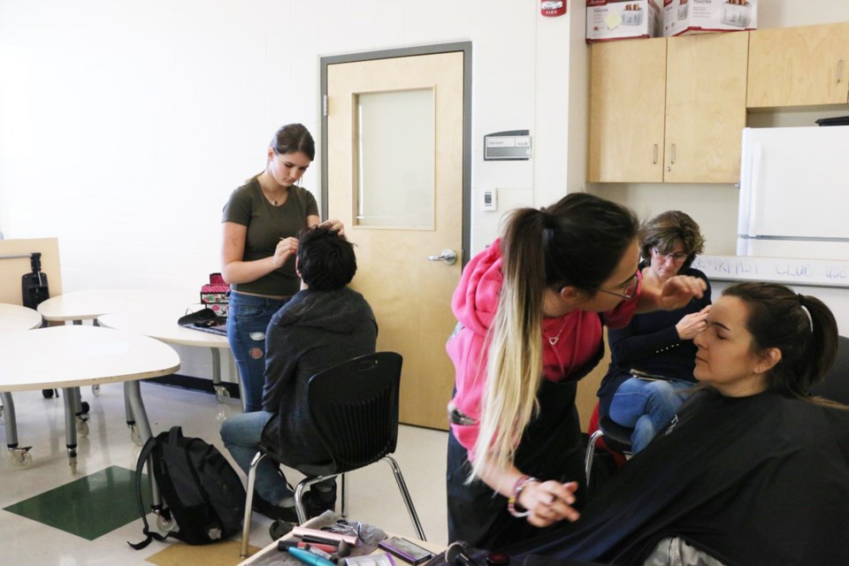 Thirty high-school students from Airdrie and Chestermere participated in Rocky View Schools' annual cosmetology competition Dec. 4 at W.H. Croxford High School. Photo: Bert Church High School Twitter
