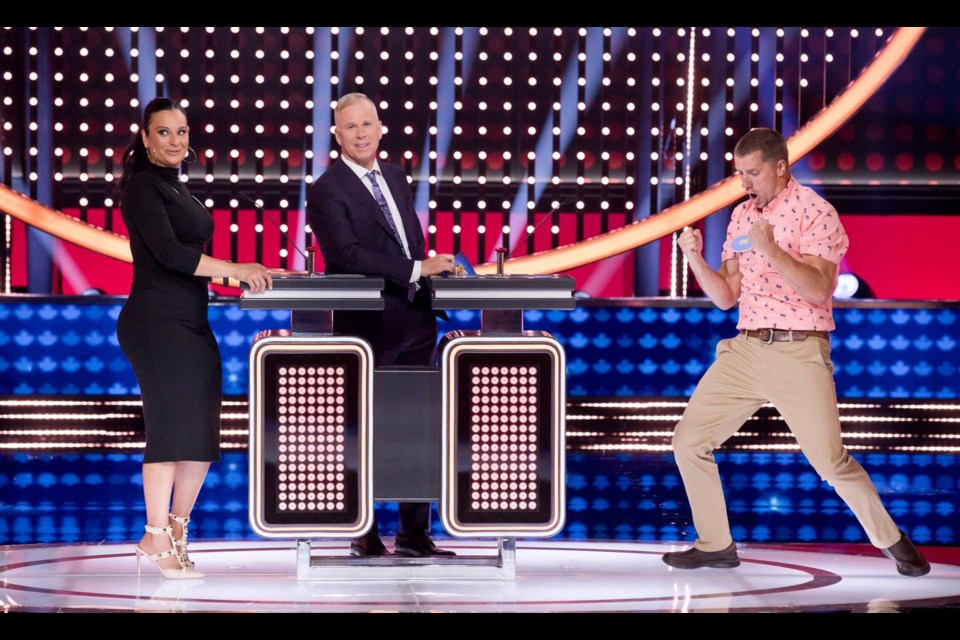 Airdrie's Levi Selk celebrates after answering a question correctly during the Family Feud Canada episode on Sept. 26.