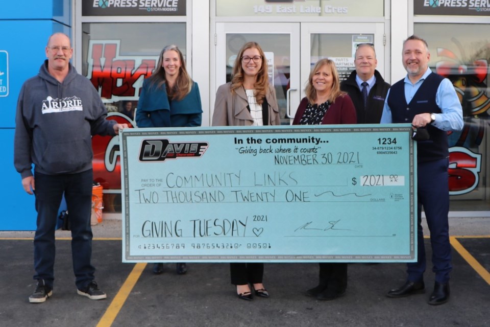 On Nov. 30, Davis Chevrole in Airdrie presented five cheques to five separate local charities. Each cheque was for $2,021, as part of the business' Giving Tuesday initiative.
