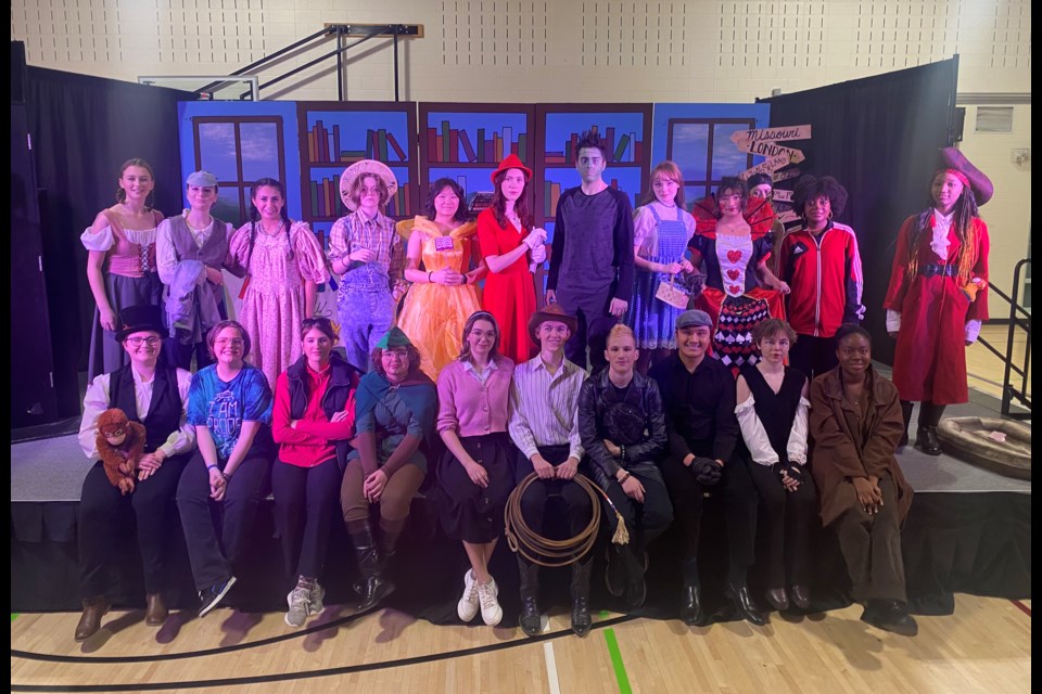 Cast and crew members from St. Martin de Porres High School's after-school drama club's latest production pose in their costumes following a performance on Feb. 8.