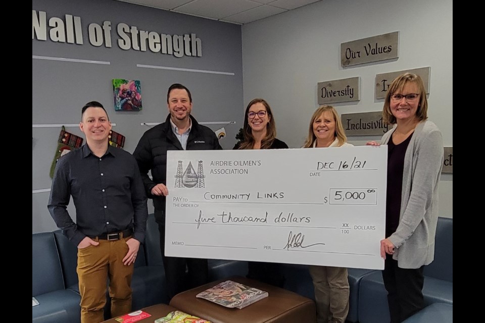 The Airdrie Oilmens Association divvied out $15,000 in charitable donations to Community Links, the Airdrie Food Bank and Airdrie and District Victims Assistance Society over the holidays. Each charity received $5,000.