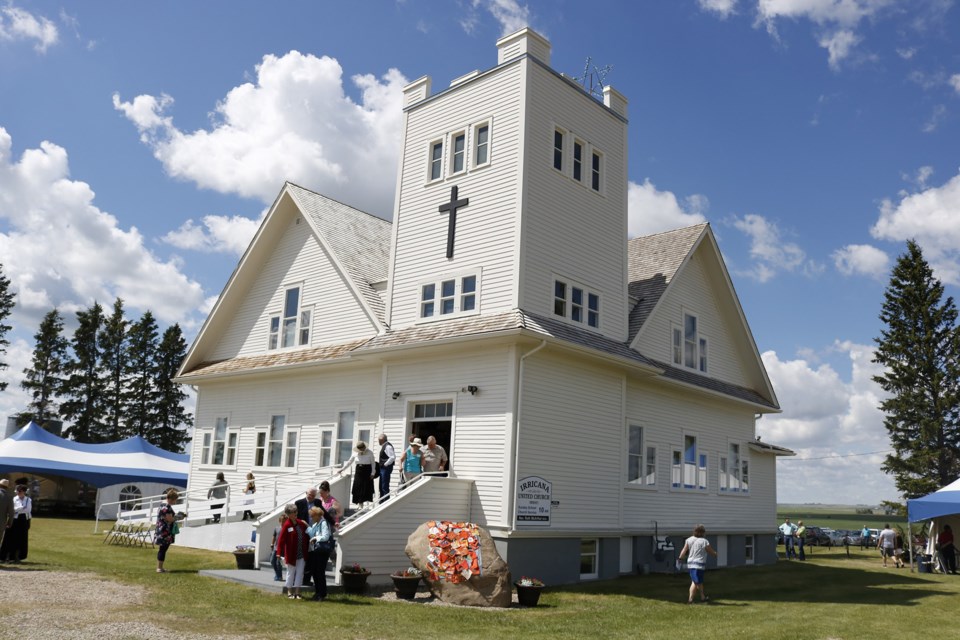 The Irricana United Church building celebrated its 100th anniversary June 16. The event began with a longer-than-usual church service in honor of its history. 
Photo by Nathan Woolridge/Rocky View Publishing