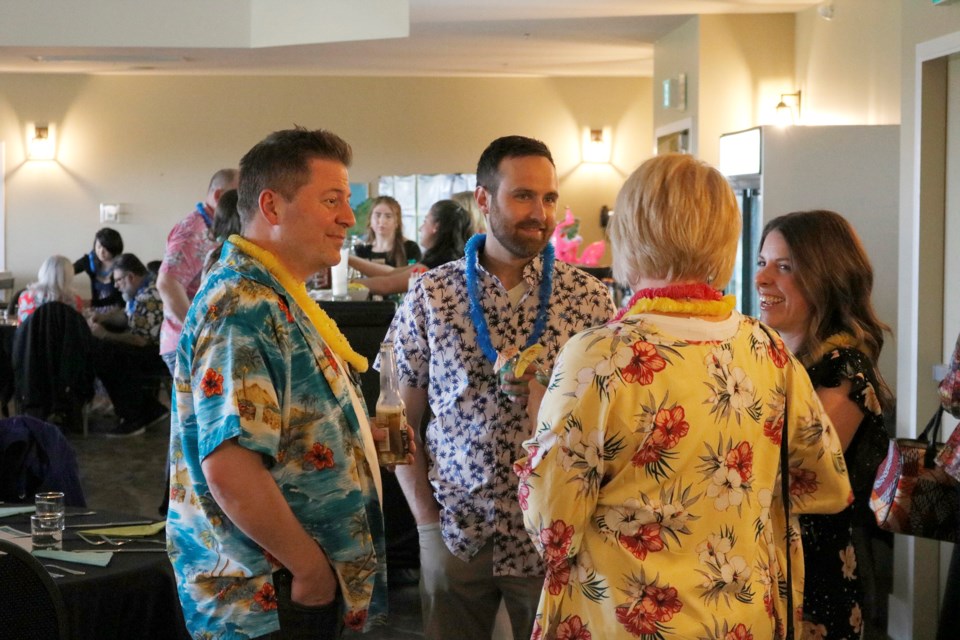 There were a lot of people wearing Hawaiian shirts at the The Boys and Girls Club of Airdrie's Luau Bash fundraiser May 25 . 
Photo by Nathan Woolridge/Rocky View Publishing