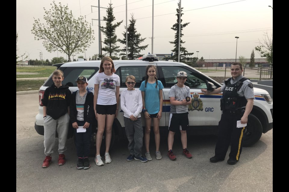 Six area students were chosen to participate in a new program with Airdrie RCMP called Cops for Kids. 
Photo Submitted/For Rocky View Publishing