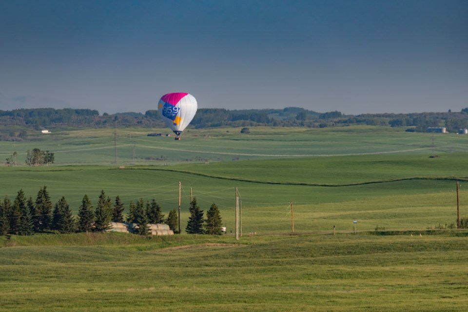 Photographer Brian Mulder captured this image of a hot air balloon drifting through Rocky View County on July 1, when temperatures rose above 30 C