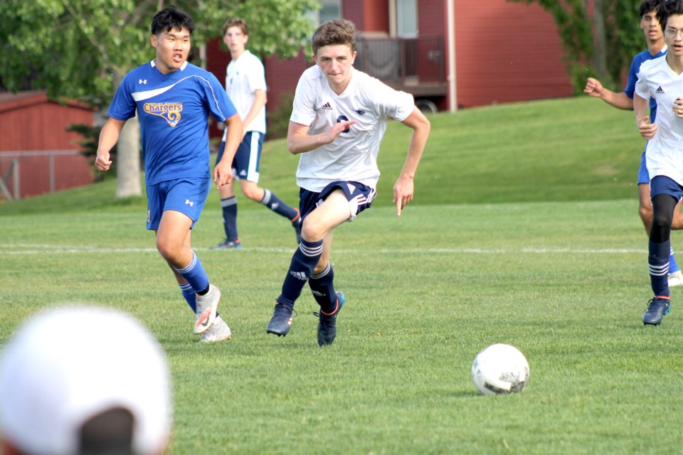 The Bow Valley Bobcats (white) suffered a blow-out to the high-flying Bert Church Chargers last week, but will look to end the regular season on a positive note when they host the George McDougall Mustangs this afternoon.