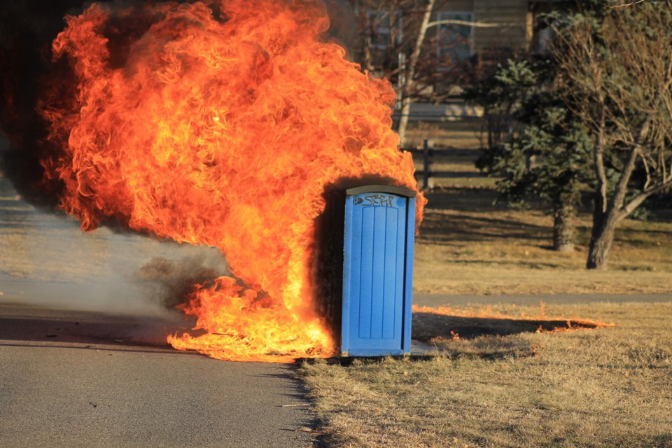 Airdrie Fire Department members were called to extinguish a garbage can fire near Bert Church High School on Nov. 22.