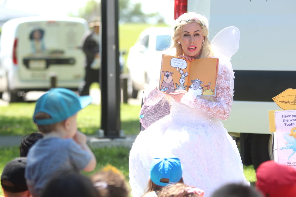 Youth in Airdrie were able to listen to a fairy princess read a story, play games, and solve puzzles in the sunshine on July 9, thanks to Airdrie Public Library's 'Once Upon a Time' event in Nose Creek Regional Park. Photo by Scott Strasser/Airdrie City View