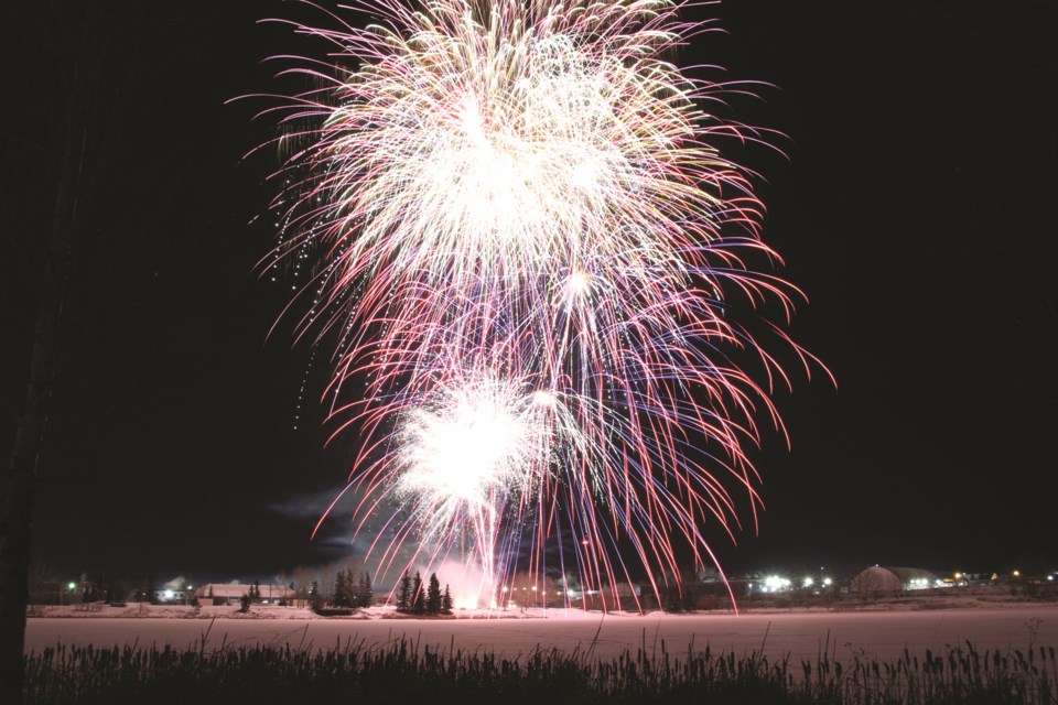 Airdrie residents rang in the new year with fireworks above East Lake on a brisk winters evening, Dec. 31.