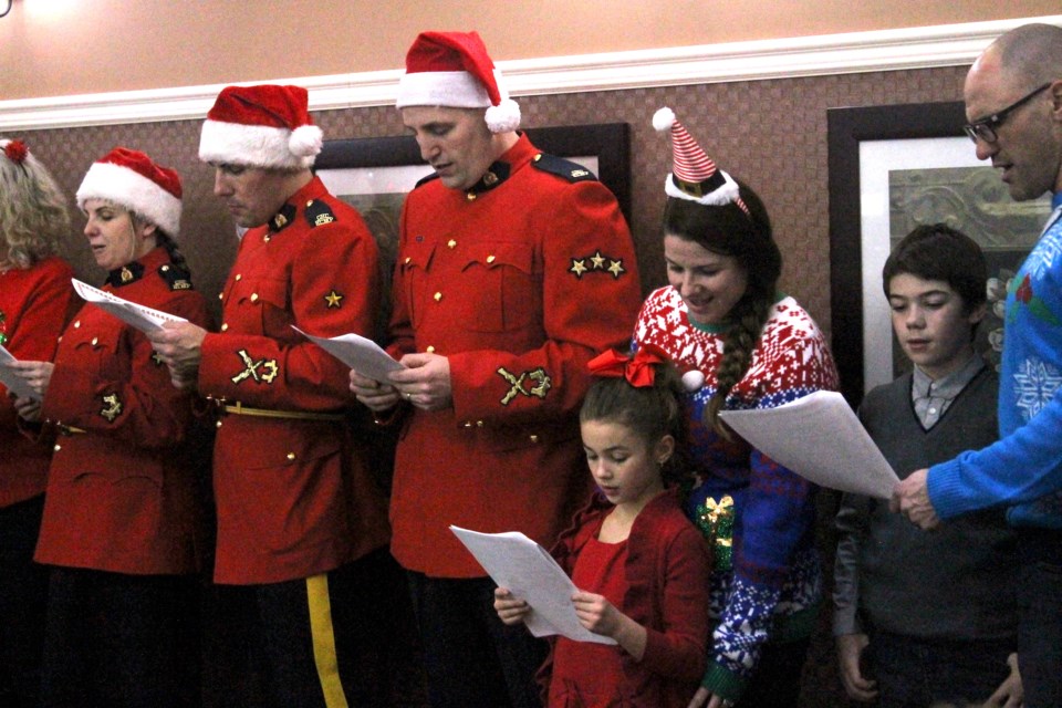 Airdrie RCMP officers and Airdrie and District Victims Assistance Society members showed off their singing chops during a Christmas carolling outing at the Luxstone Manor senior living facility on Dec. 13.
