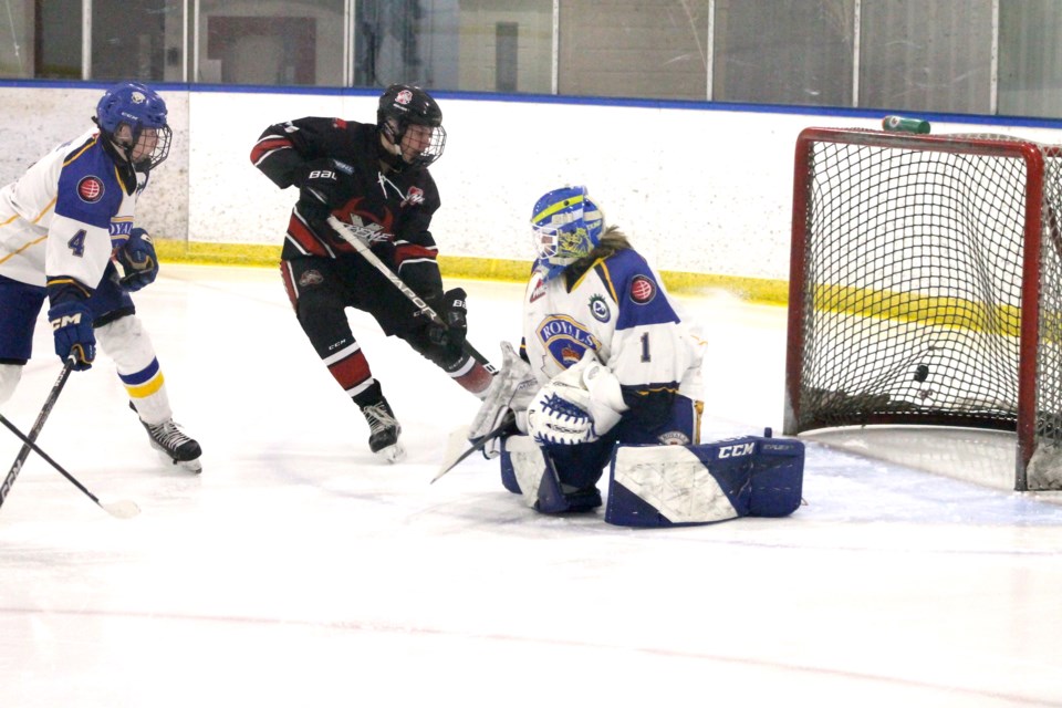 Cochranite Riley Boychuk scores for the Airdrie Xtreme during a 2023 playoff game against the Calgary Royals.