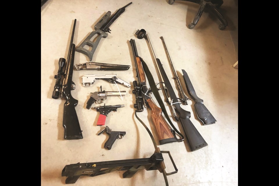 Four people were arrested in Morley May 7, following an RCMP seizure of weapons and drugs. Photo submitted/For Airdrie City View