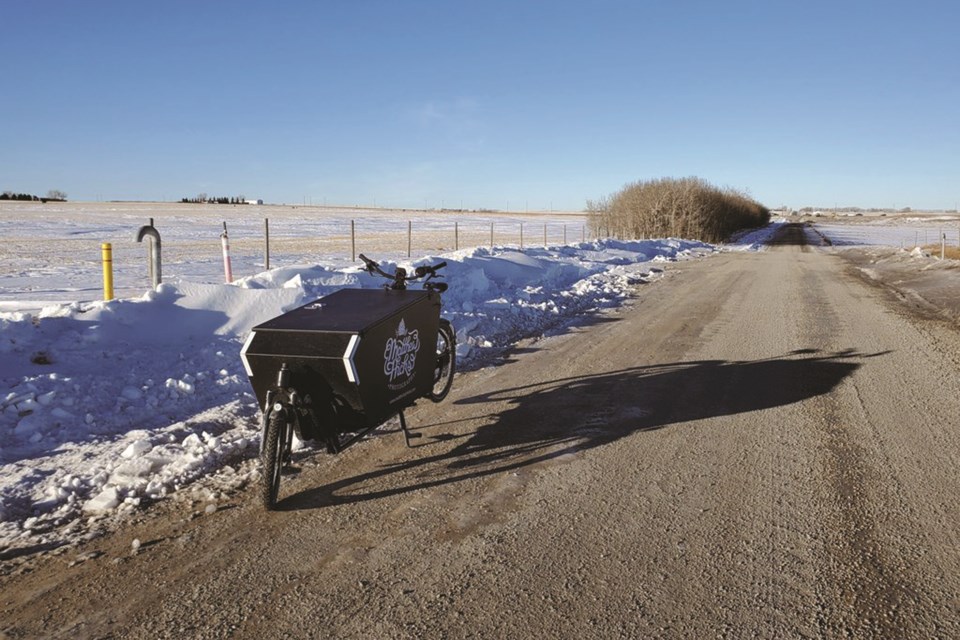 A Calgary photographer who uses his bicycle to travel to assignments is reaching out to Airdrie City council about the possibility of improving the conditions for cycling between the two cities.