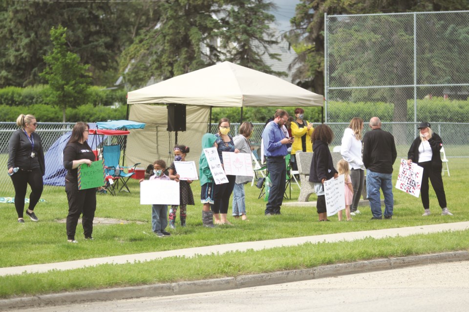 A July 7 rally in Crossfield against racism drew roughly 15 people.Photo by Scott Strasser/Rocky View Weekly.