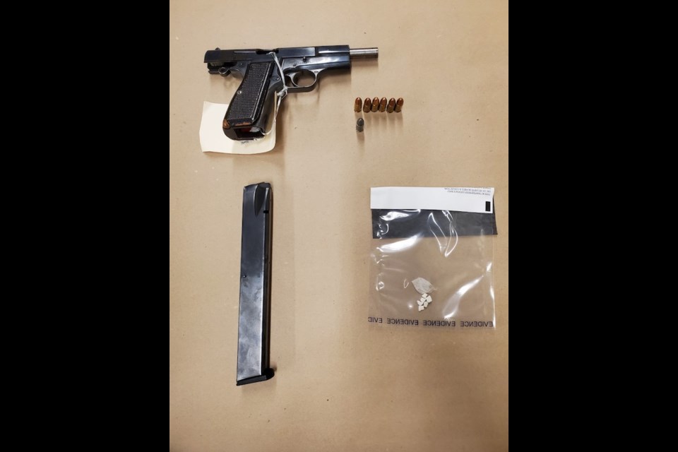 A 19-year-old male was arrested for possession of a restricted, stolen firearm and small amounts of crack cocaine in Airdrie on July 25 