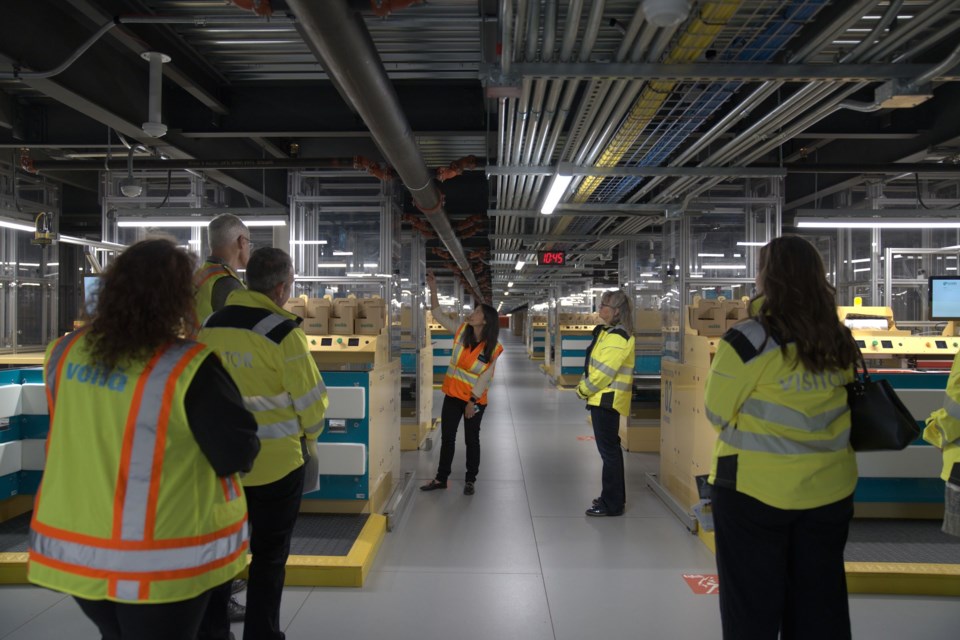 Empire Company Ltd. unveiled its new fulfillment centre in Balzac on June 27, showcasing a facility that uses robots to sort and assemble online grocery store orders.