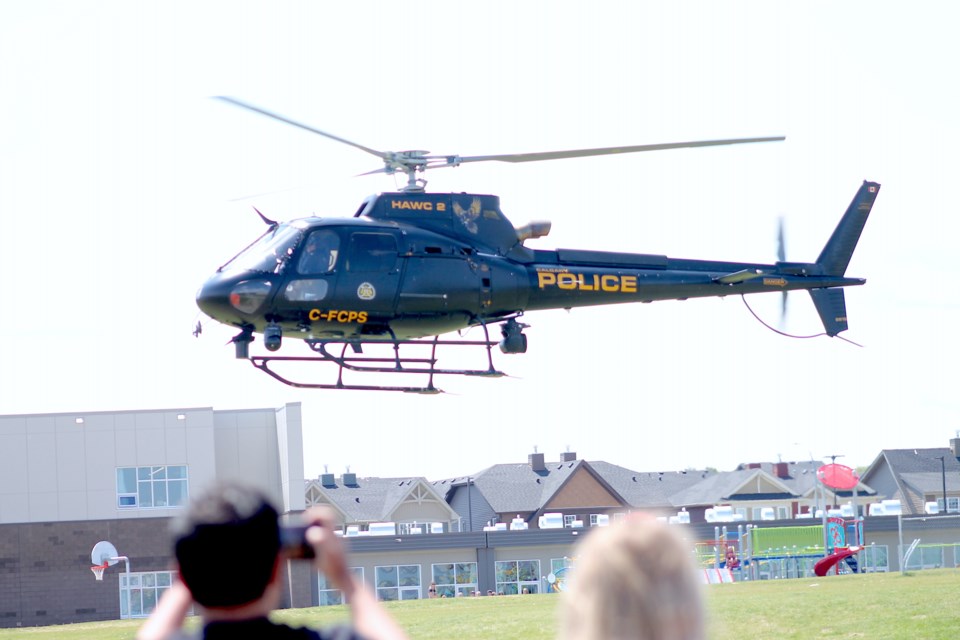 A HAWCS helicopter landed in between Fireside School and Holy Spirit School. The pre-planned spectacle a big highlight for Fireside's kindergarten class on June 23.