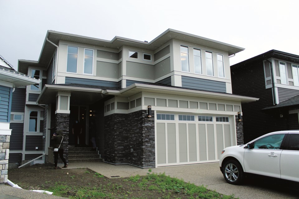 The Home For Hope in Airdrie sold for $825,000, and will result in the donation of more than $200,000 to children's hospitals in Calgary and Edmonton.