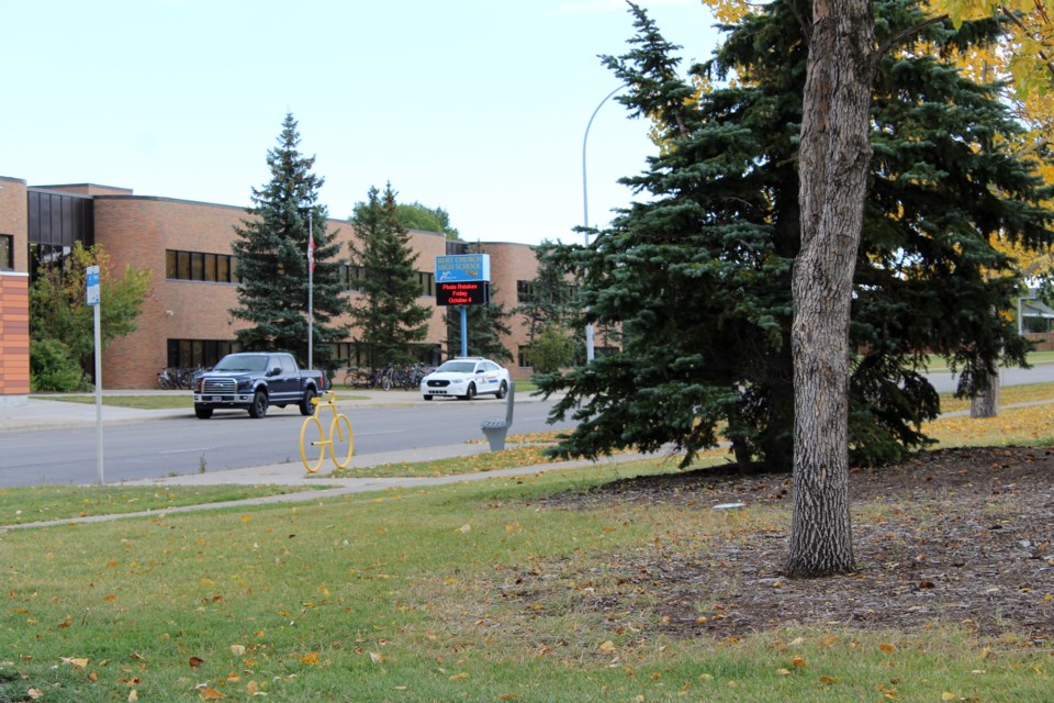 An RCMP police cruiser was parked outside Bert Church High School at roughly 1 p.m. Sept. 24. Photo by Scott Strasser/Rocky View Publishing
