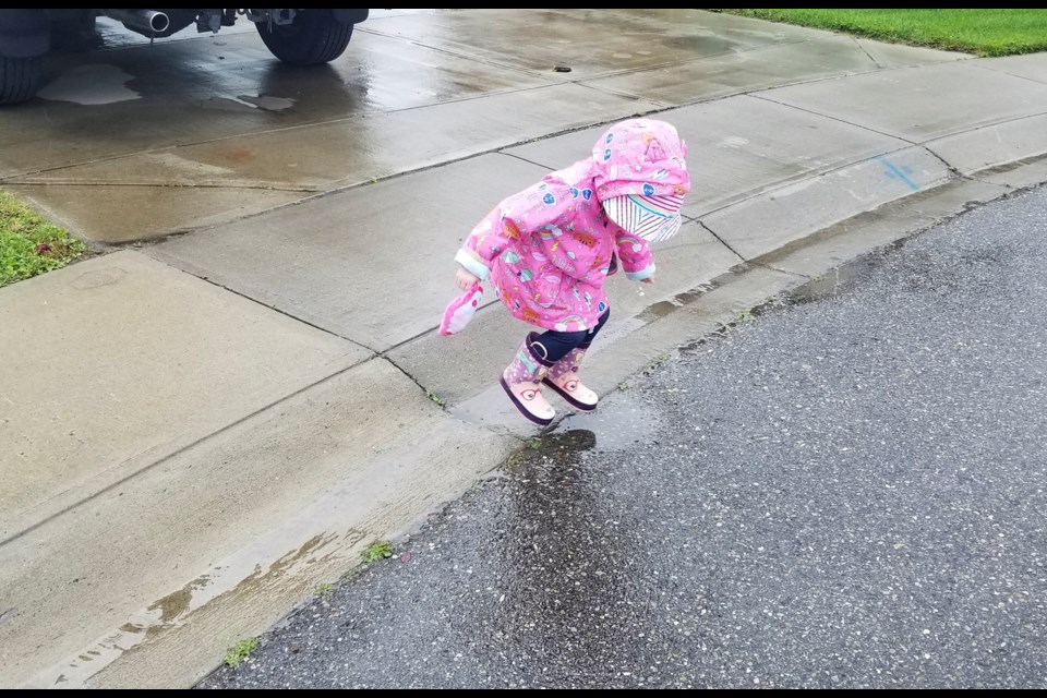 A rainy morning Sept. 10 made for the perfect puddle hopping weather in Bayside.
Photo by Allison Chorney/Rocky View Publishing