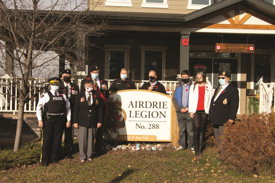 Dignitaries and Legionnaires met at the Airdrie branch of the Royal Canadian Legion on Oct. 28 to kick off the annual poppy campaign.