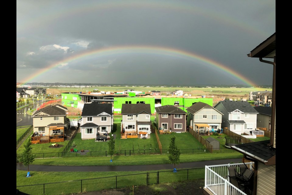 The July 14 storm that brought a tornado to Crossfield and caused an approximately six-inch hole from a lightning strike on the roof of an Airdrie home, also produced this rainbow. Harsaab Singh captured this shot from his home in Hillcrest, the afternoon of July 14.
Photo by Submitted/For Rocky View Publishing