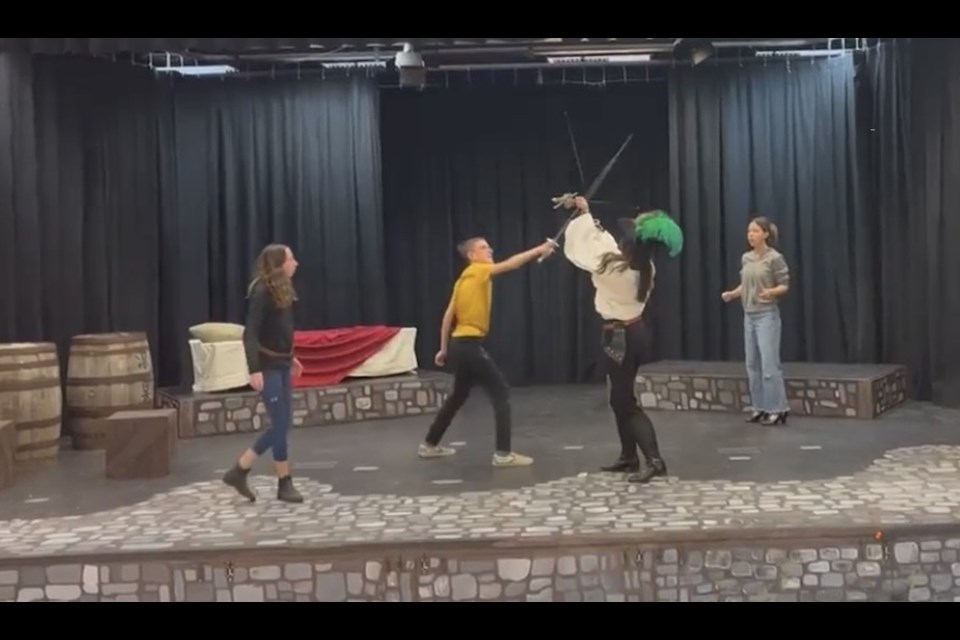 Springbank students practice their sword-fighting choreography for the upcoming Three Musketeers production.