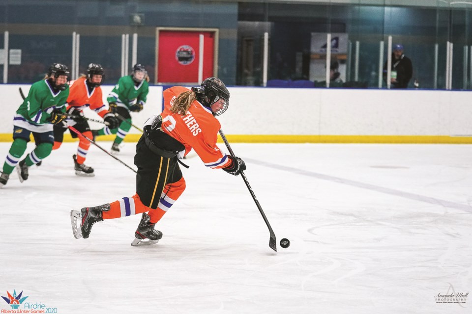 Zone 4 athlete Claire Carruthers, of Crossfield, scored the winning, overtime goal in the girls' hockey tournament gold-medal game. Photo Submitted/Rocky View Weekly