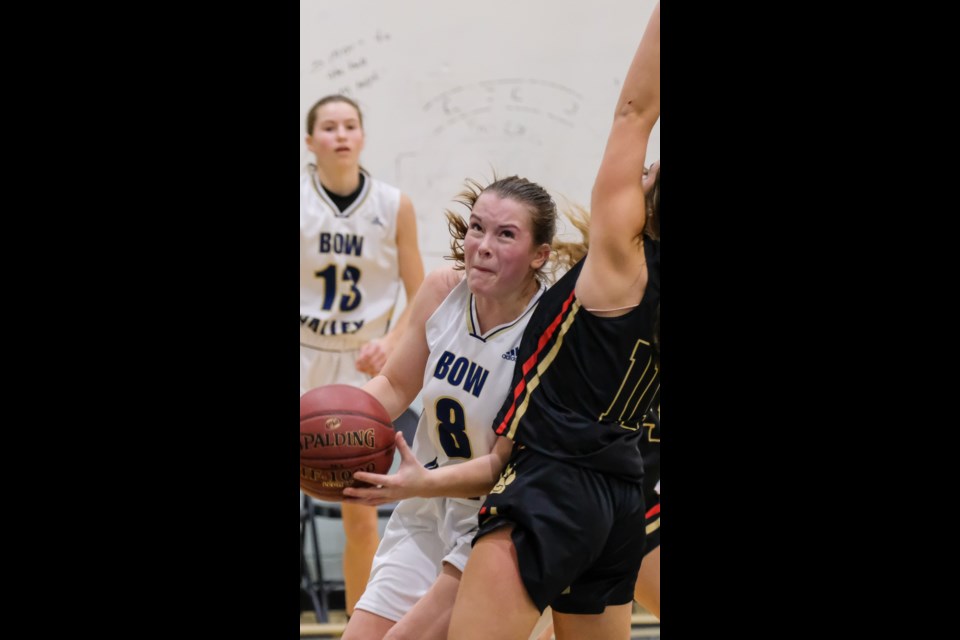 Bobcat Josie Powers drives toward the net during Bow Valley's season-opener against Chestermere on Dec. 6.