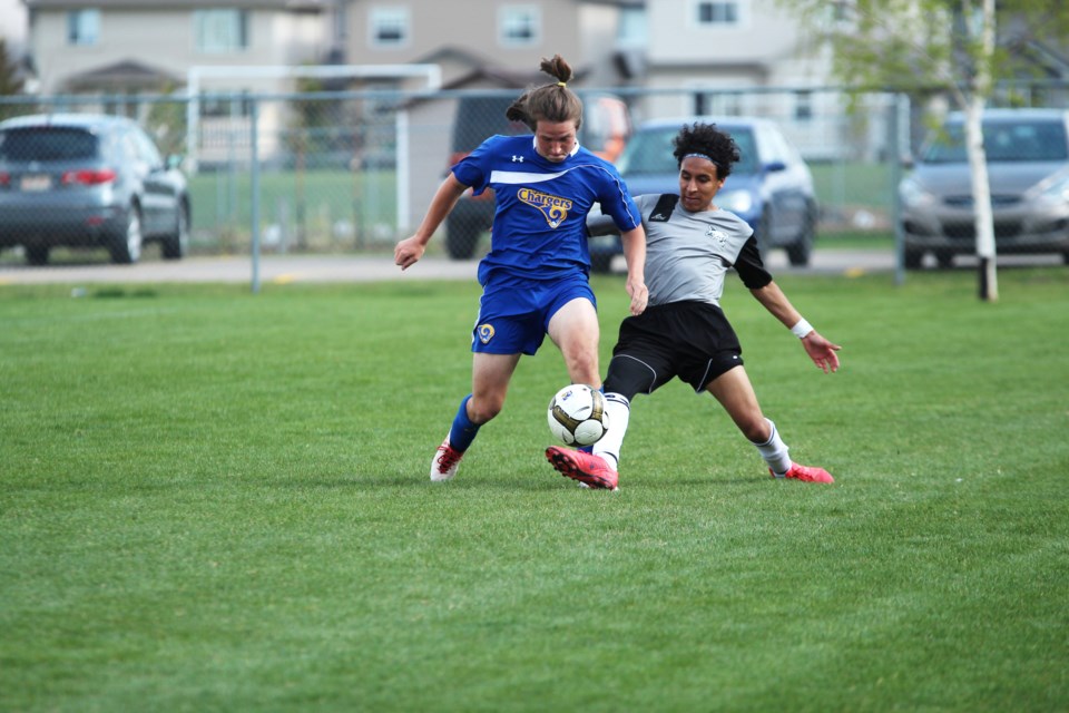 The Bert Church Chargers boys' soccer team concluded its regular season with an impressive 6-0-0 record after defeating the George McDougall Mustangs 3-1 in an all-Airdrie. 
Photo by Scott Strasser/Rocky View Publishing 