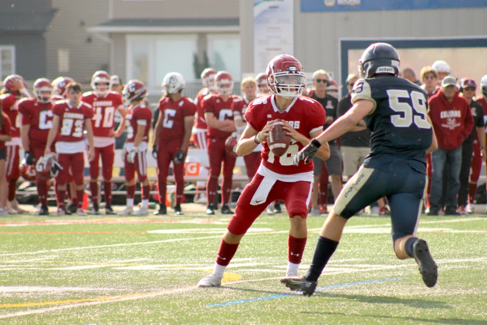 Cochrane Cobras' quarterback Noah Makkreel winds up for a pass during the team's 54-3 win over the Bow Valley Bobcats last week.