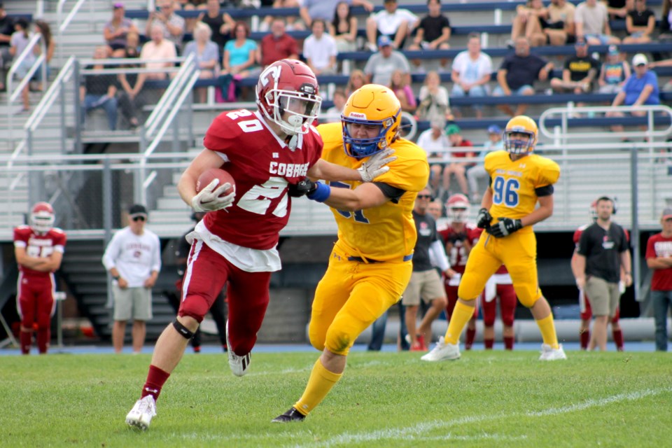 Running back Ethan Clazie scored three touchdowns for the Cochrane Cobras to help the team beat the Bert Church Chargers on Aug. 26, in the 2022 Rocky View Sports Association season-opener.