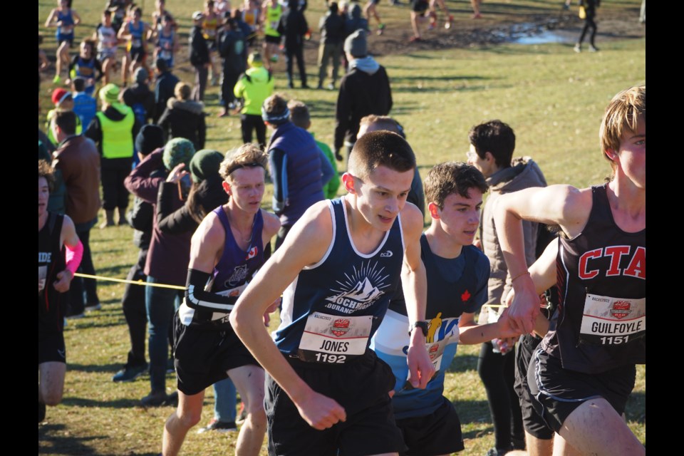 Caden Jones fights for his place in the U18 boys' cross-country national championship race in Ottawa on Nov. 26.