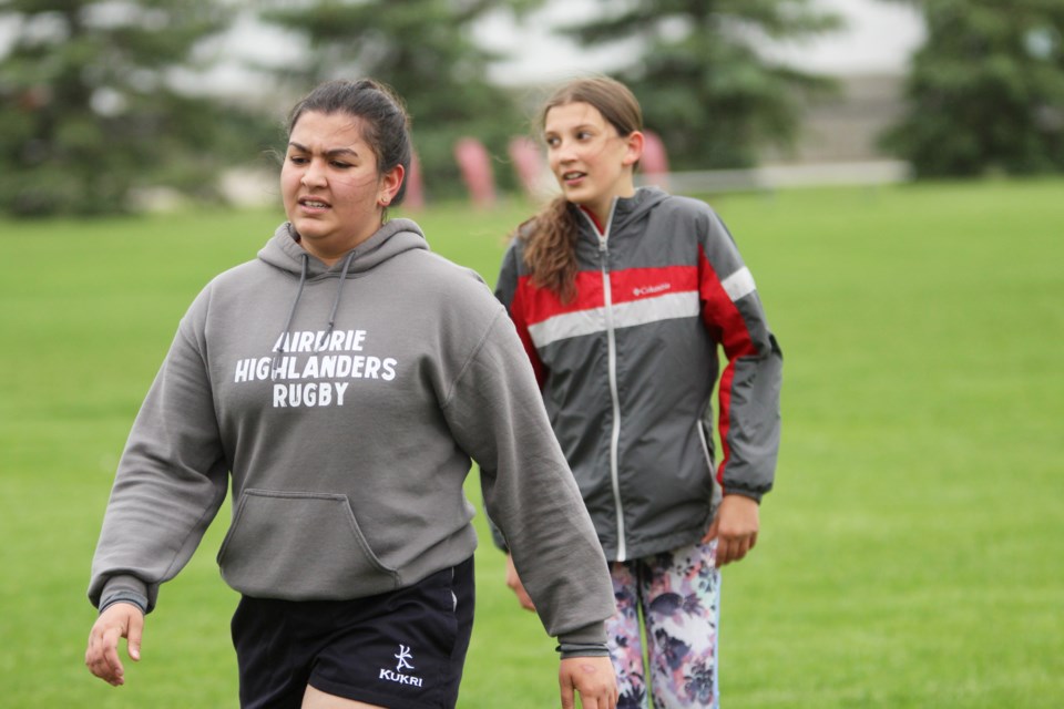 Members of the Airdrie Highlanders are preparing for the Stampede 7s rugby tournament, July 5 and 6 in Calgary. The club is holding twice-weekly training sessions on Tuesday and Thursday evenings. 
Photo by Scott Strasser/Rocky View Publishing