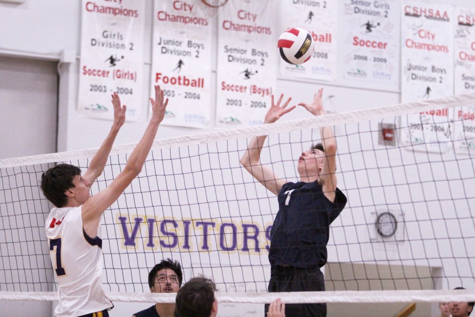 The St. Martin de Porres Kodiaks senior boys' volleyball team swept the Central Memorial Rams Oct. 3 in Calgary. Photo by Scott Strasser/Rocky View Publishing