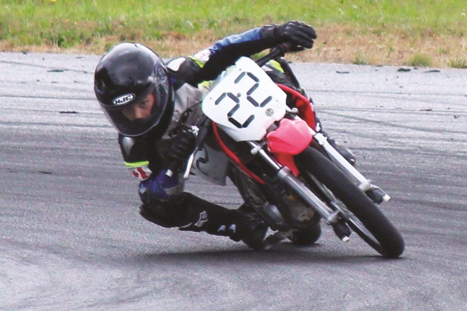 Langdon youth Lincoln Scott enjoys tearing up the blacktop on his motorbike whenever he has the chance. Photo submitted/For Rocky View Weekly.